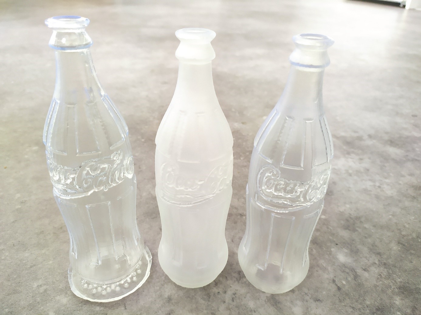 lattina di coca cola stampata in 3d in resina trasparente