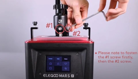 Calibration procedure of the Elegoo Mars MSLA resin 3D printer showing build‑plate leveling and Z‑zero adjustment.