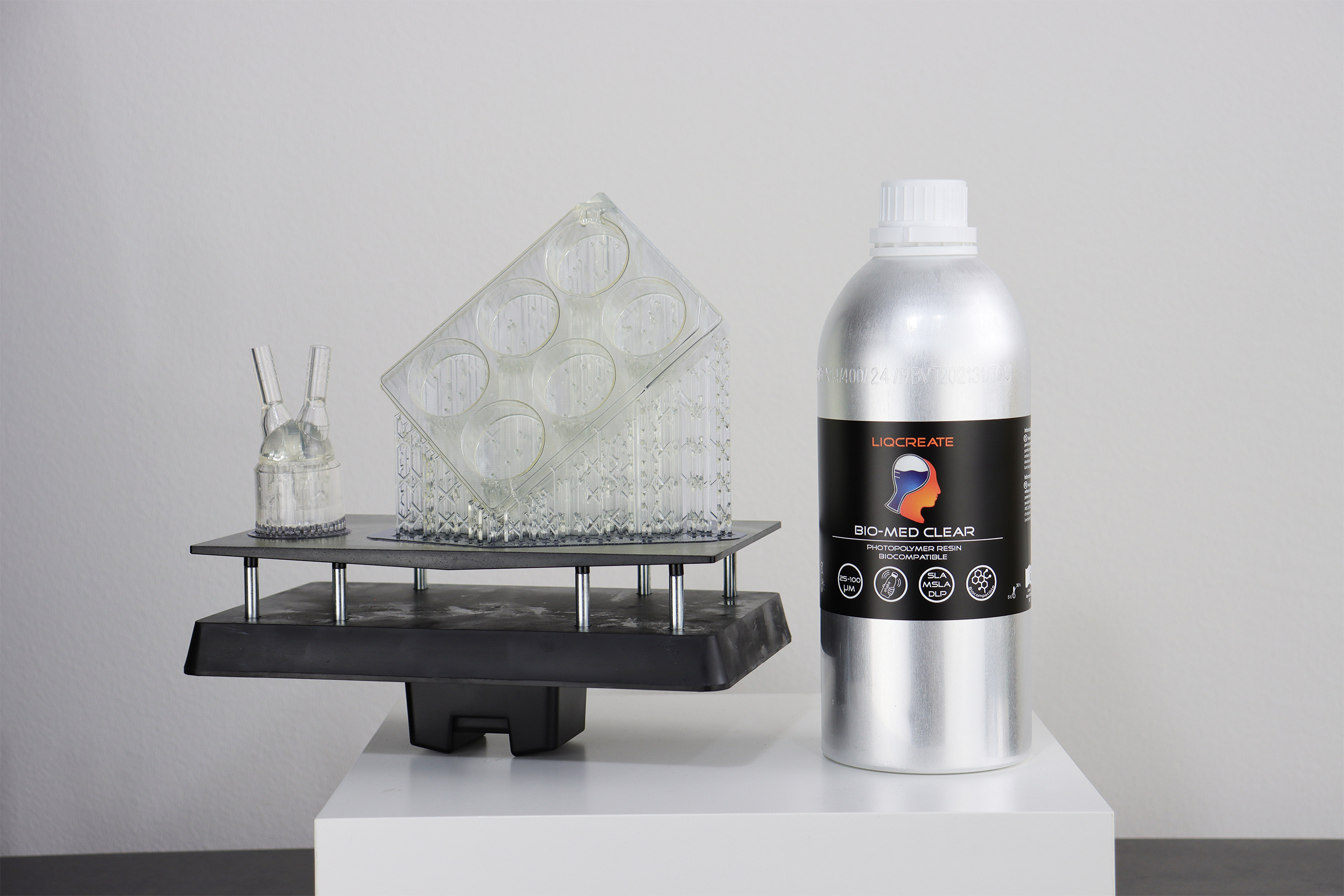 Parts printed on the Elegoo Mars 5 Ultra using Liqcreate Clear Impact resin, showing transparent components with smooth surfaces and high dimensional accuracy.